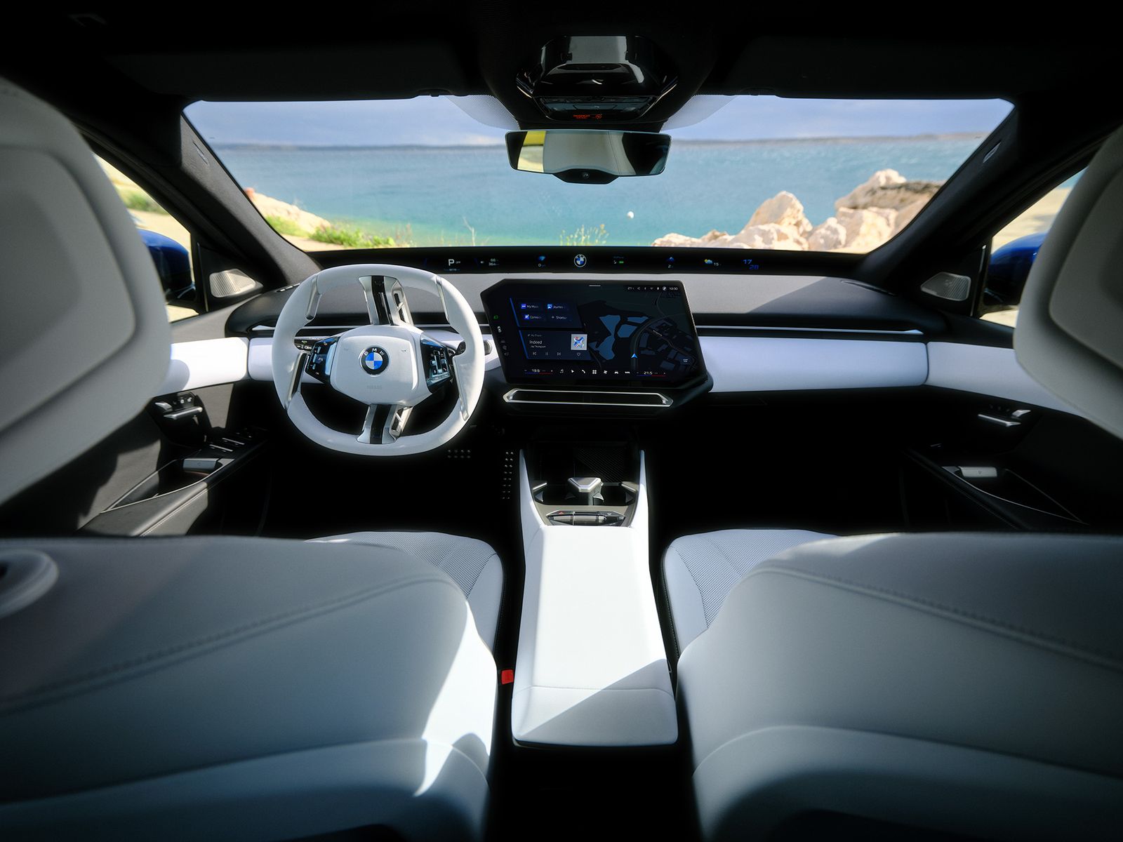 Cockpit des BMW i3 mit hellem Interieur, Zentral-Display und Panoramic Vision